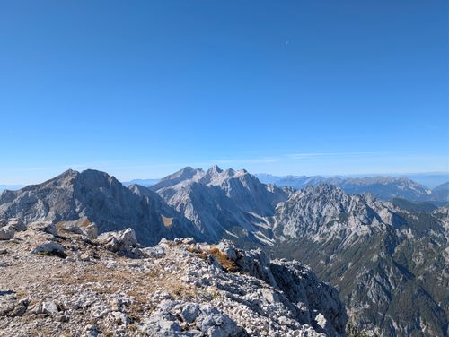 Free Scenic view of the rugged Kamnik Alps under a clear blue sky in Slovenia. Stock Photo
