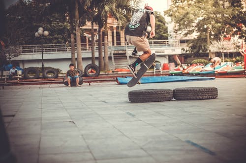 Man Playing Skateboard on Skate Park