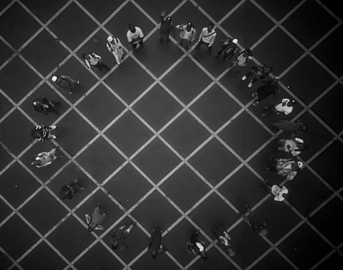 Free Aerial shot of a group of people forming a geometric square in Kaduna, Nigeria. Stock Photo