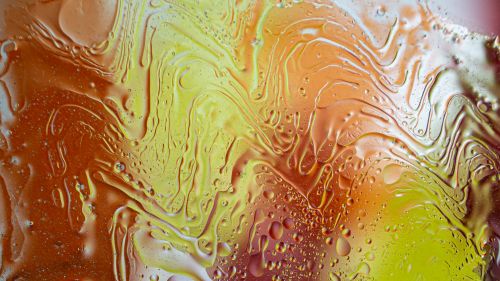 Free Fluid art featuring vibrant swirling patterns and textures in warm colors, perfect for modern decor. Stock Photo
