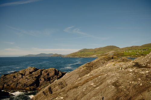 Free Discover the breathtaking rocky coastline of County Kerry, Ireland, captured in brilliant sunlight. Stock Photo
