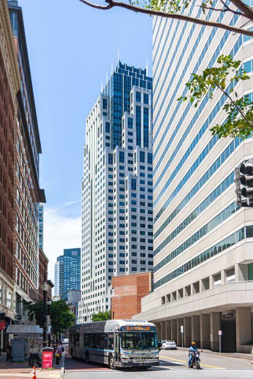 Free Contemporary Boston cityscape featuring impressive skyscrapers and urban street life. Stock Photo