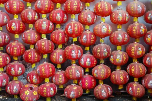 Free A colorful display of traditional red Chinese lanterns in Jawa Tengah, Indonesia, symbolizing festivity. Stock Photo