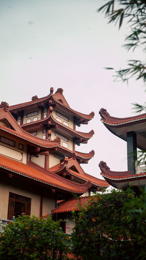Free A serene view of a traditional Vietnamese pagoda with distinct architectural style in Ho Chi Minh City, Vietnam. Stock Photo