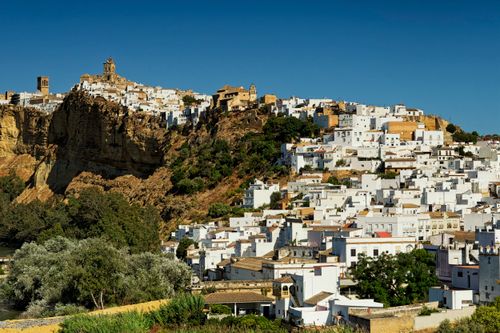 Free Aerial view of the stunning Arcos de la Frontera, a hilltop town in Spain with whitewashed buildings. Stock Photo