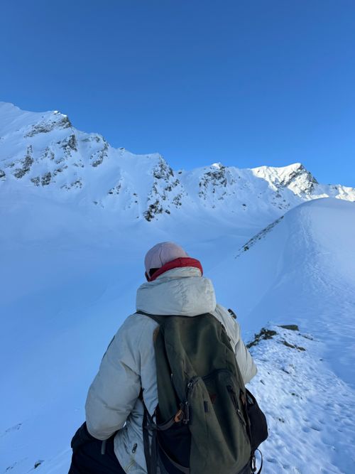 Free Adventurous trekker discovers the pristine snowy landscapes of Uttarakhand's Himalayas. Stock Photo