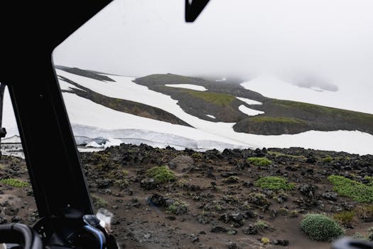 Snow-covered landscape seen from a helicopter in Kamchatka, Russia.