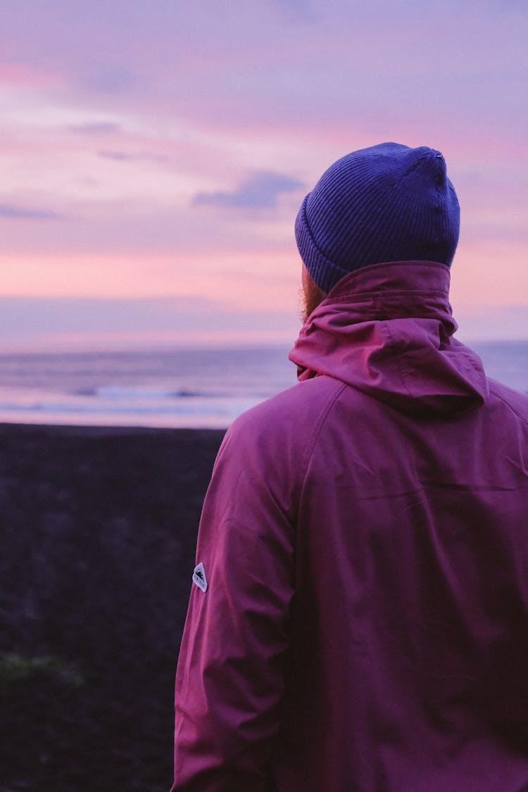 Person Wearing A Purple Beanie And Jacket