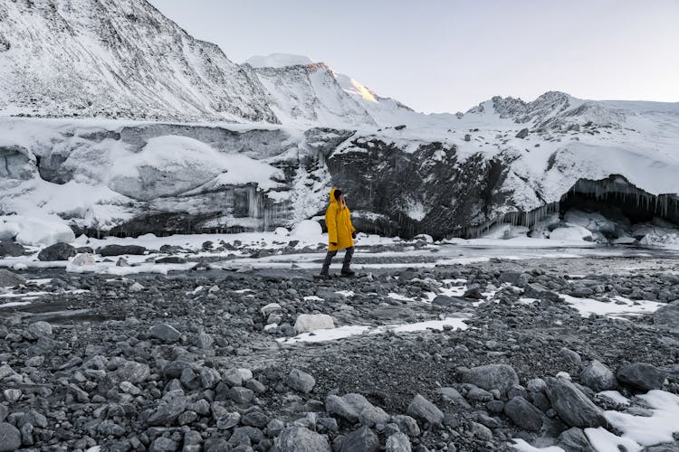 Person Standing On Rocks