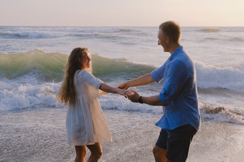 Playful Couple at the Beach