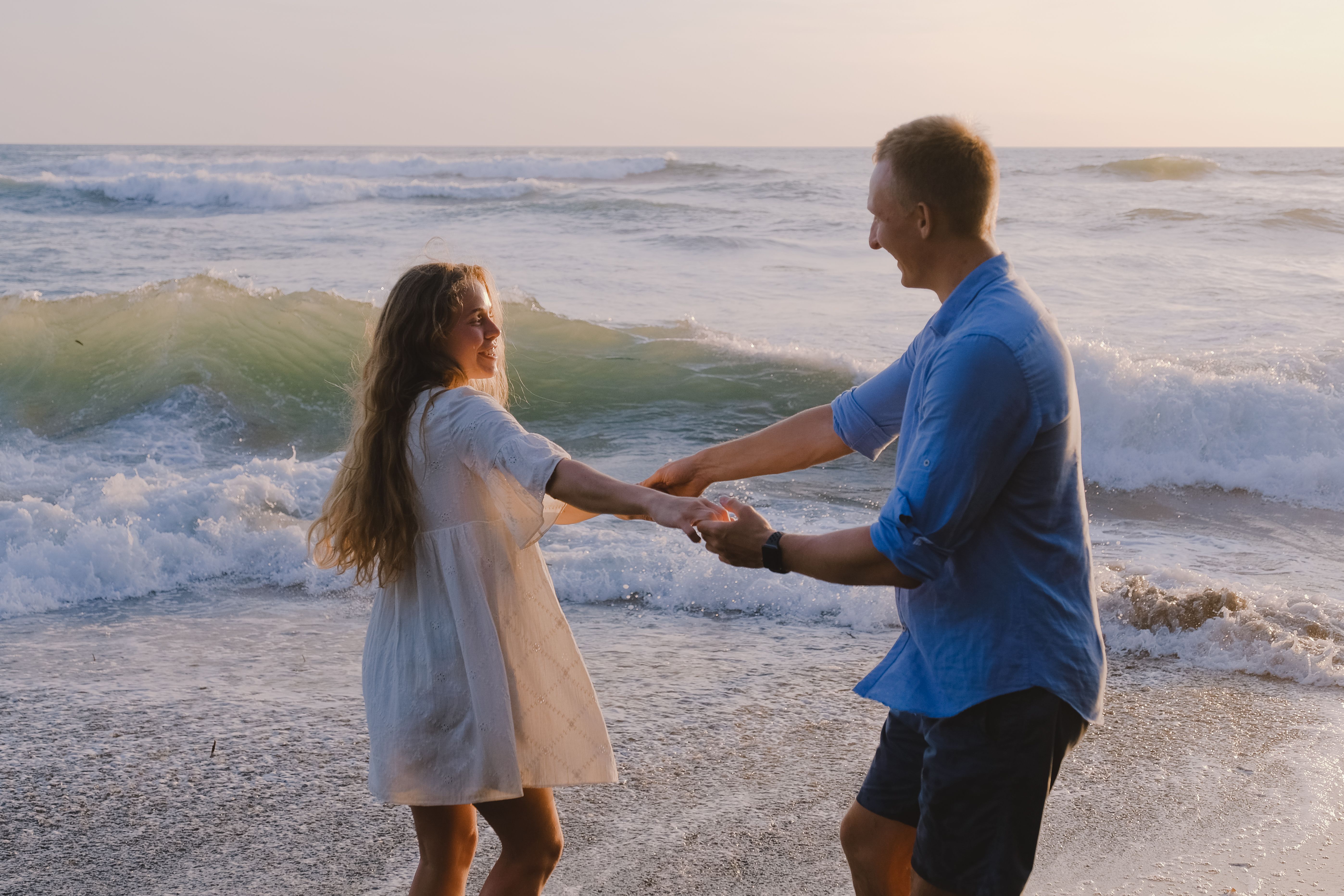 Romantic Couple Kissing at the Beach · Free Stock Photo