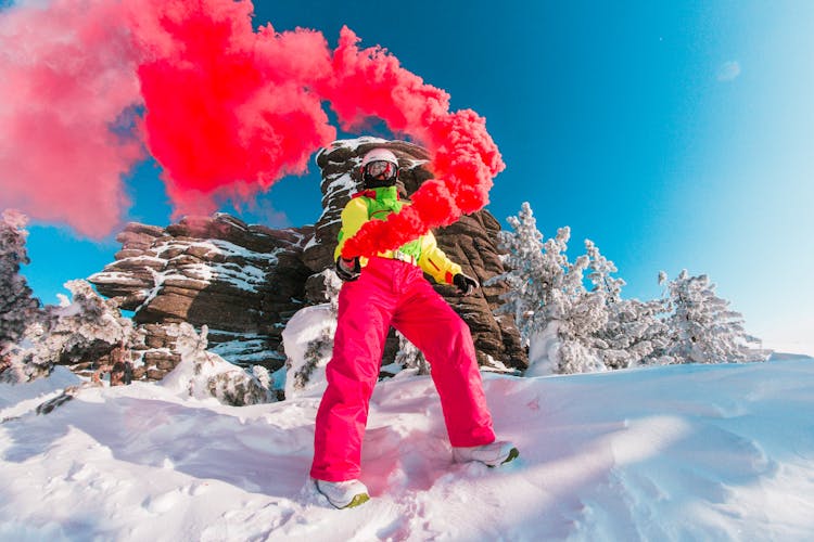 Person Wearing A Colorful Jacket And Pink Pants