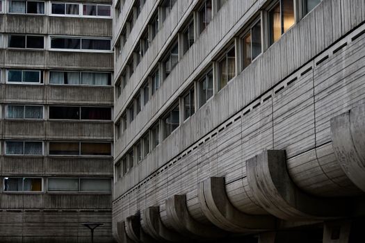 Close-up view of a brutalist concrete building facade showcasing geometric design and pattern.. close, view, brutalist