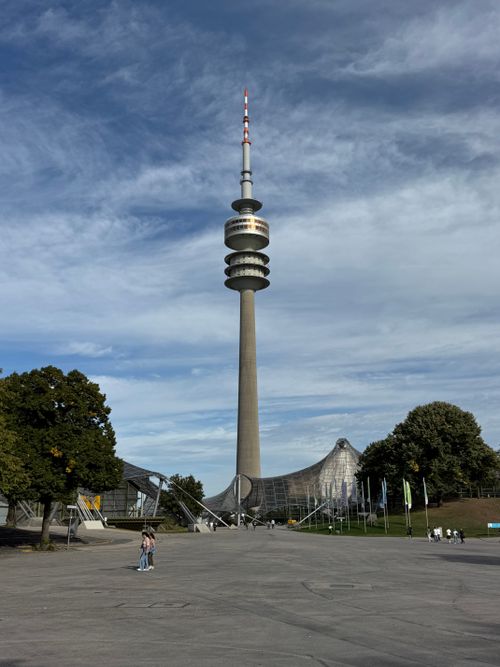 Free View of the Olympiaturm TV tower in Munich's Olympic Park with a clear sky backdrop. Stock Photo