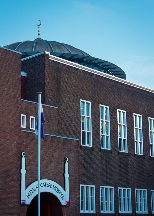 Free HDV Kocatepe Mosque exterior with Dutch flag, showcasing its architecture. Stock Photo
