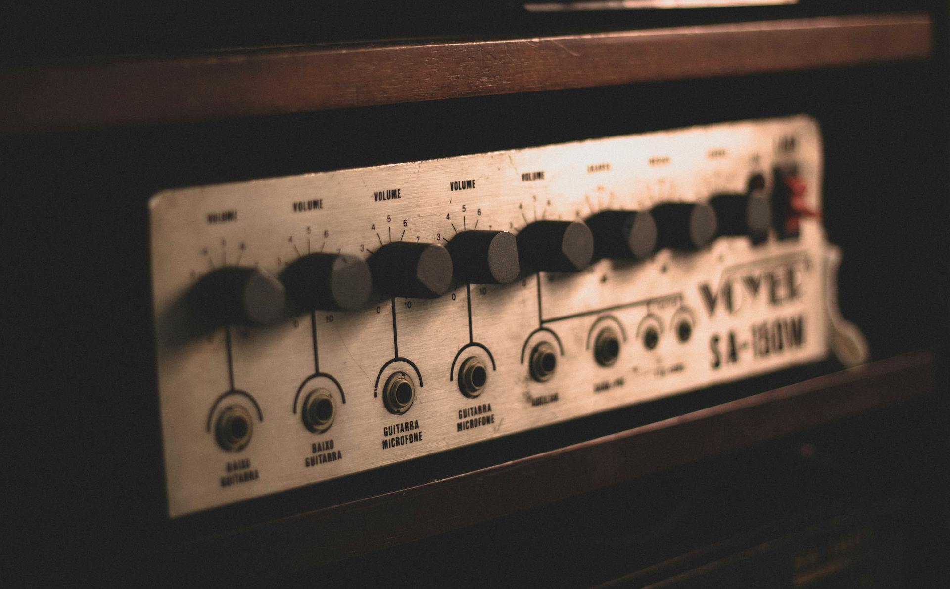 Retro audio equipment on wooden shelf