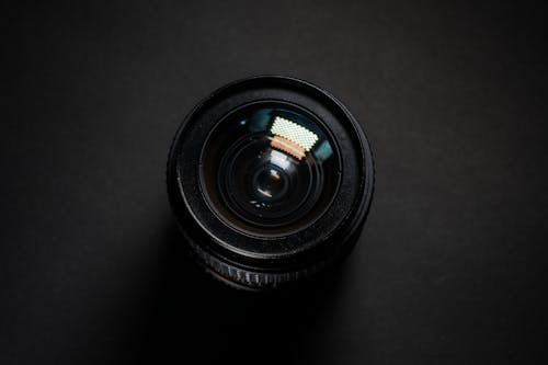 Black Camera Lens on Black Surface