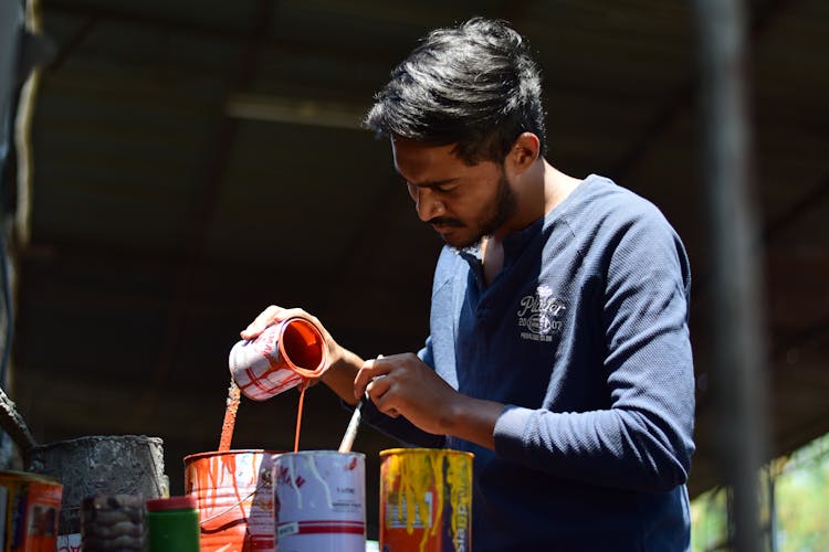 Man Mixing Paint