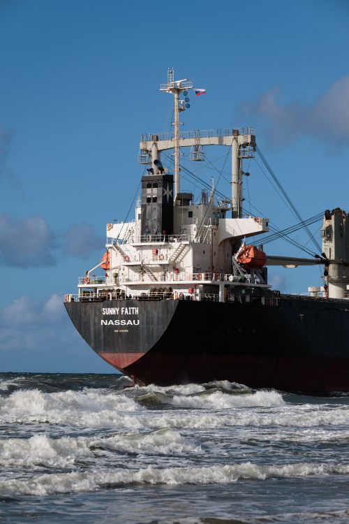 Free Large cargo ship navigating through rough seas near Kaliningrad, Russia. Stock Photo