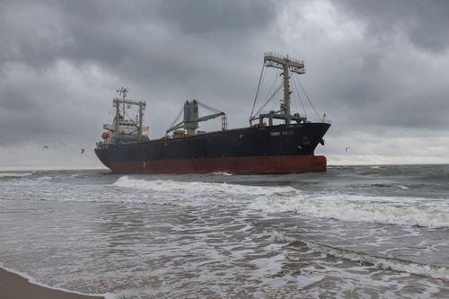 Free A large cargo ship navigating the choppy seas of Kaliningrad Oblast under cloudy skies. Stock Photo