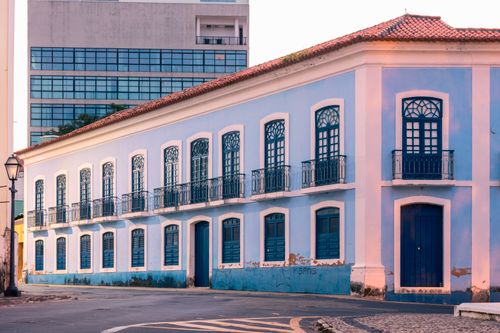 Free Charming colonial blue building with classic architecture in Maranhão, Brazil, during the evening light. Stock Photo