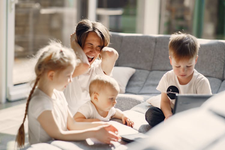 Mother Going Crazy With Small Children At Home