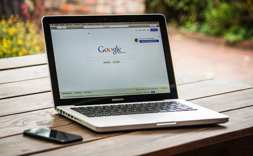 Free Google Search Engine on Macbook Pro Stock Photo