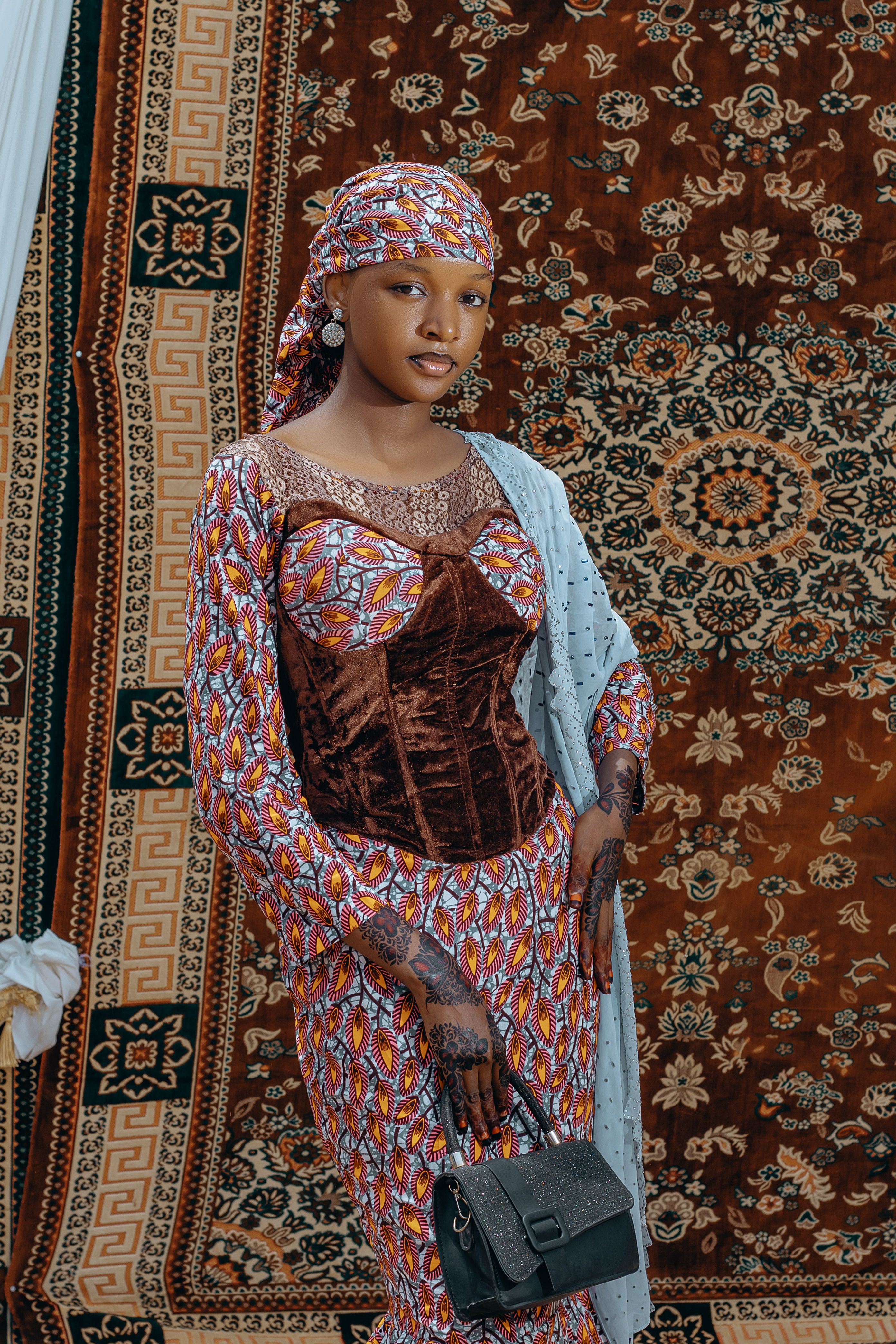 Traditional Nigerian Fashion Portrait with Henna Art · Free Stock Photo