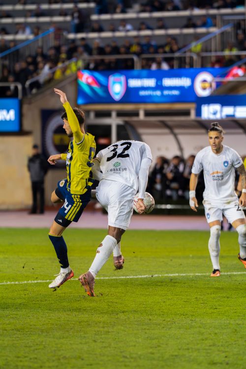 Free Exciting soccer game action captured during a match in Baku, Azerbaijan stadium. Stock Photo