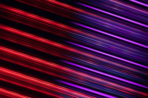 Free Vibrant neon light streaks in abstract pattern ideal for backgrounds. Stock Photo