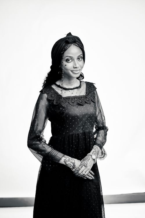 Free Black and white portrait of woman in traditional attire with henna. Stock Photo