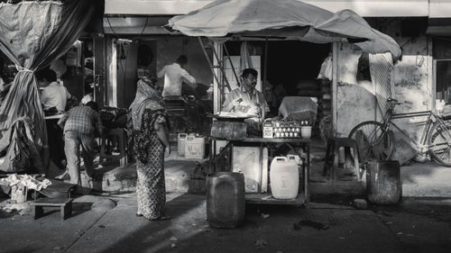 Free Authentic outdoor market scene showcasing daily life in India with vendors and shoppers. Stock Photo