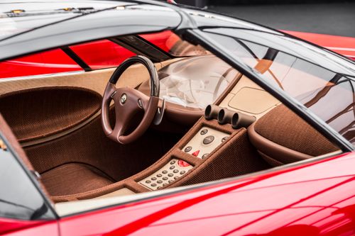 Free Stylish interior view of a luxury sports car featuring sleek design and high-end materials. Stock Photo