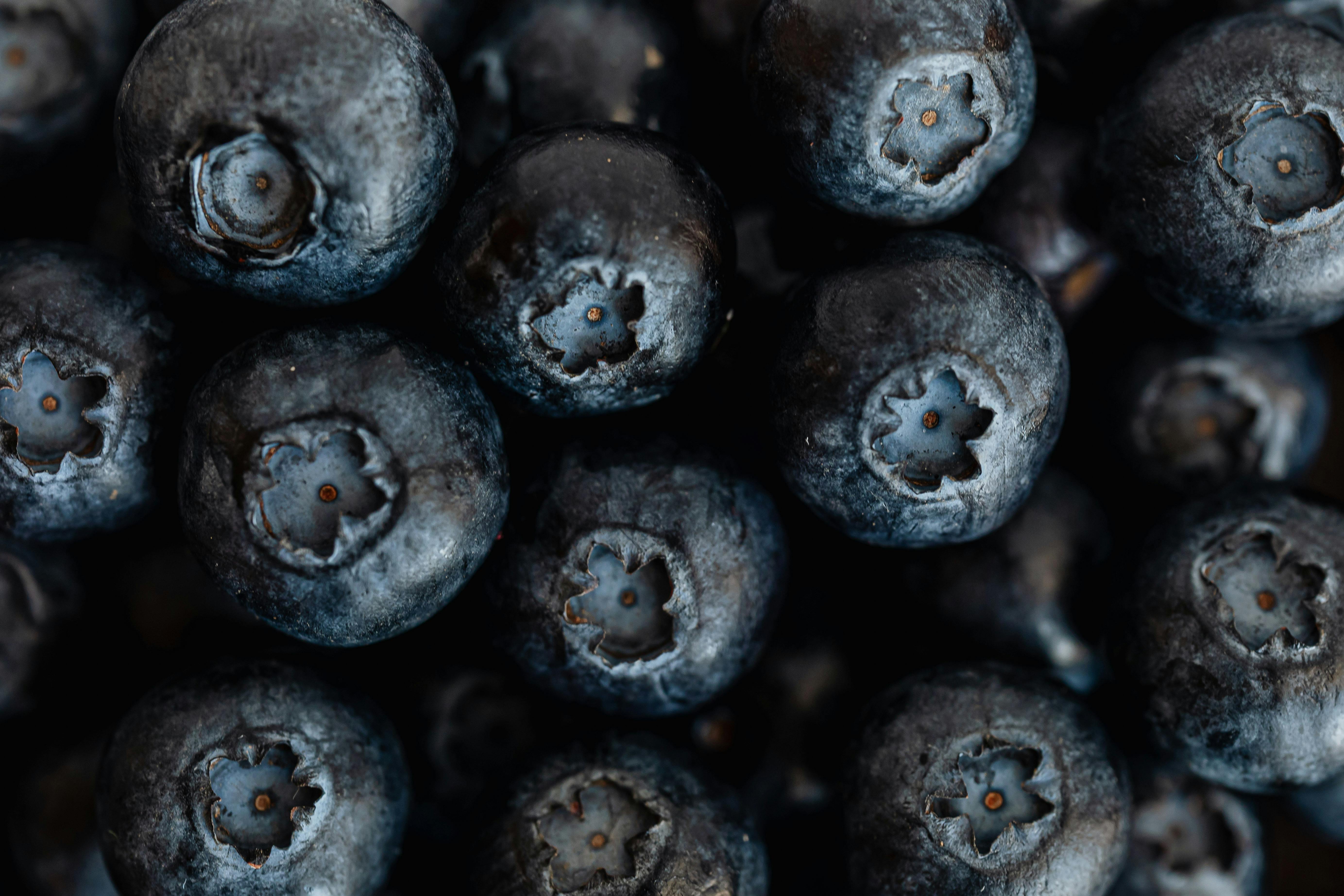 fresh ripe blueberries on market stall