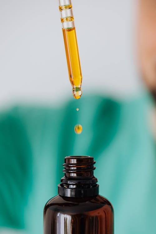 Faceless doctor preparing medicine in laboratory