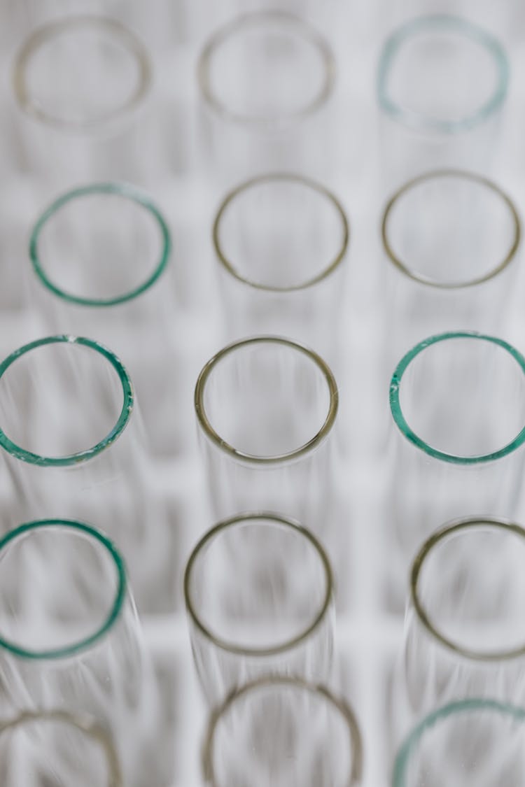 Rows Of Glass Tubes With Circles Of Different Colors