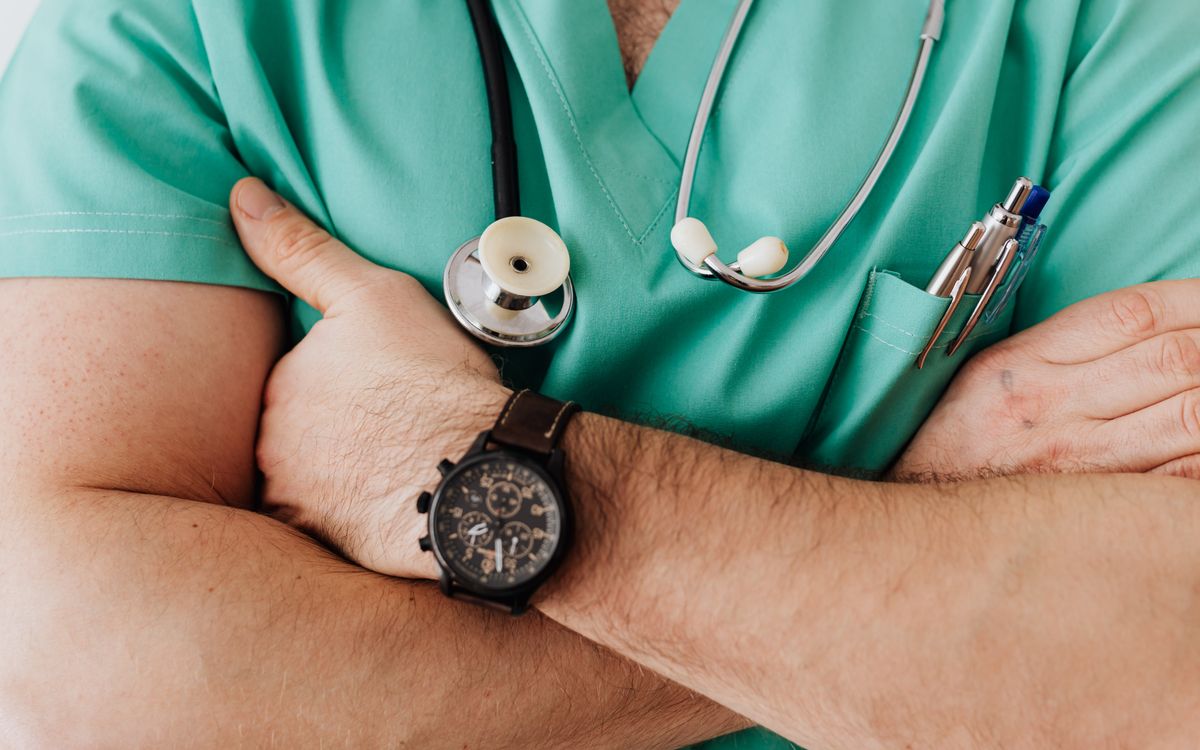 Doctor reviewing notes with a patient