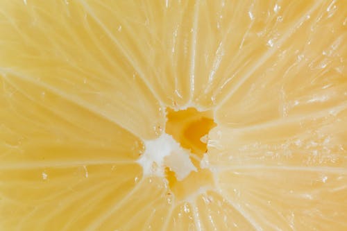 Free Closeup cross section of lemon with fresh ripe juicy pulp Stock Photo