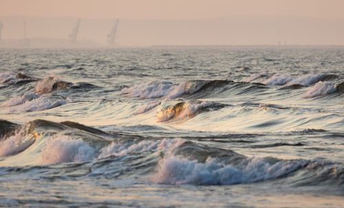 Free A calming view of gentle waves on the Baltic Sea during sunset, capturing tranquility and natural beauty. Stock Photo