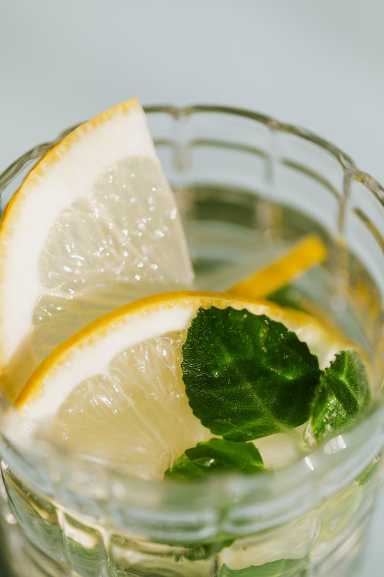 Glass Of Fresh Cocktail With Lemon And Mint