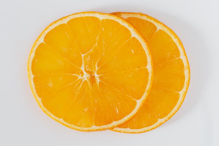 Orange Round Slices On White Background