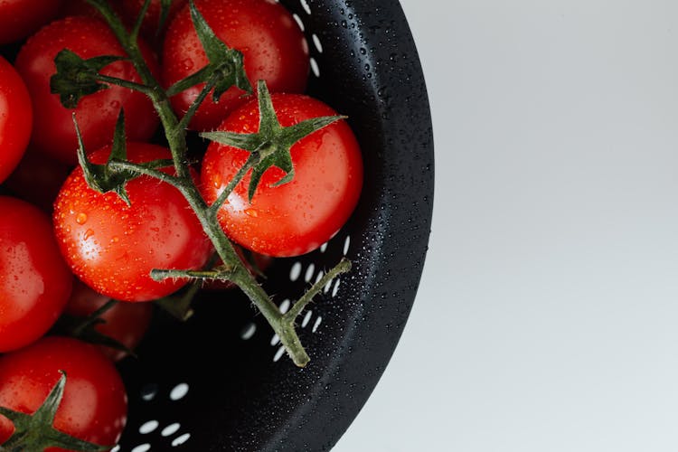 Tomatoes With Drops In Strainer