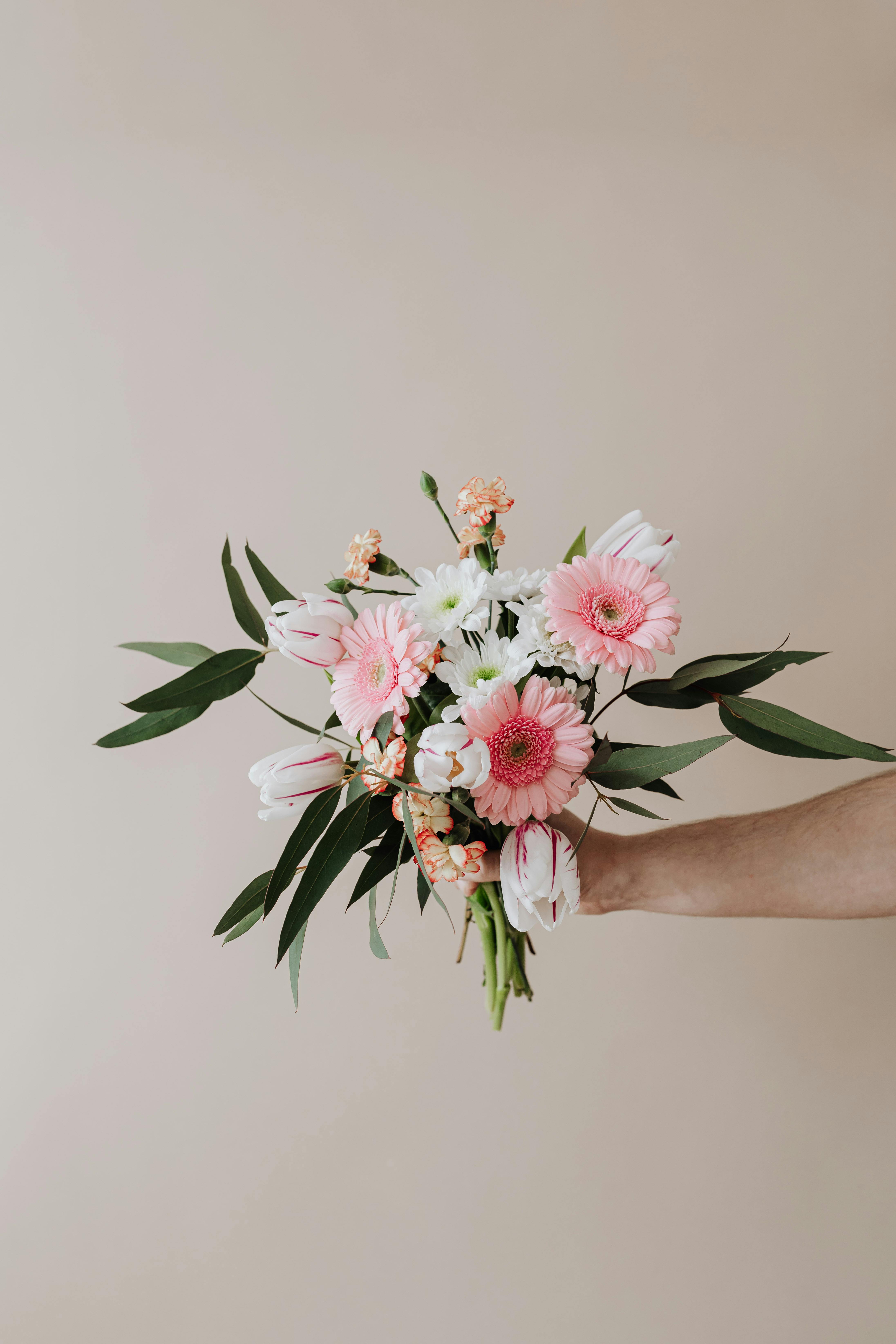 bouquet of flowers held by a person