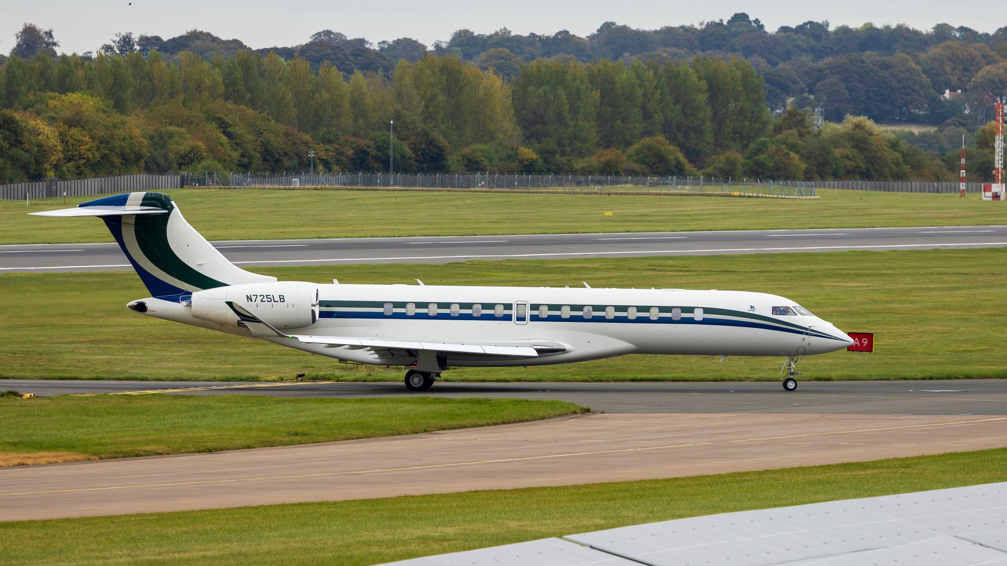 A private jet lined up on a runway in Scotland, a UK departure that pays private jet air passenger duty