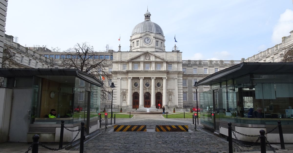 A view of the iconic Government Buildings in Dublin, highlighting its neoclassical architecture on a clear spring day.