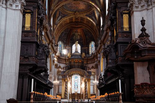 Free Majestic interior of St Paul's Cathedral in London featuring ornate architecture and stained glass windows. Stock Photo
