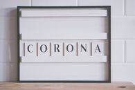 Dispenser with soap and Corona word