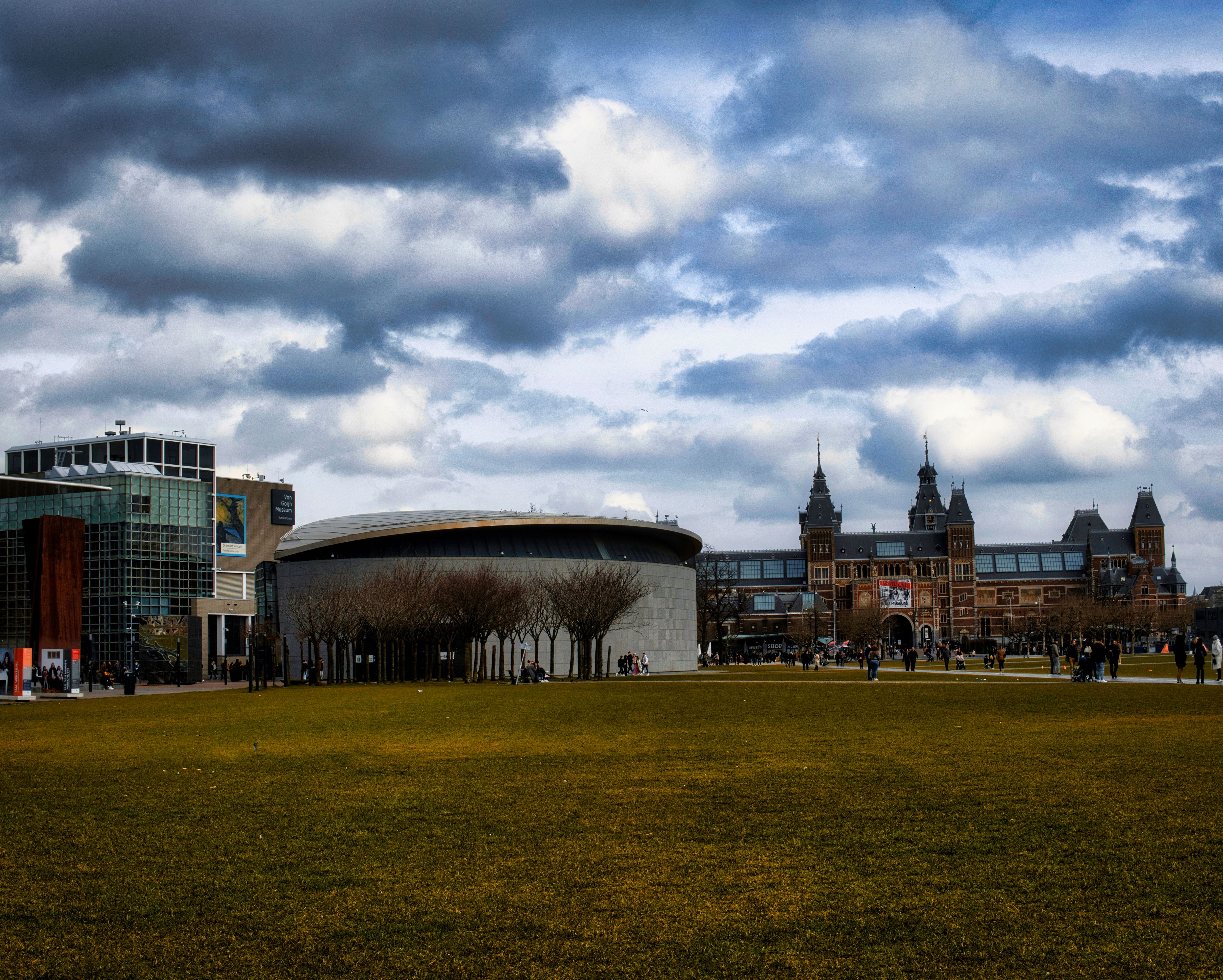 A view of the Rijksmuseum and Van Gogh Museum on a cloudy day in Amsterdam, Netherlands.