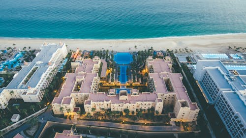 Free Aerial View Of Hotel Buildings Near Sea Stock Photo