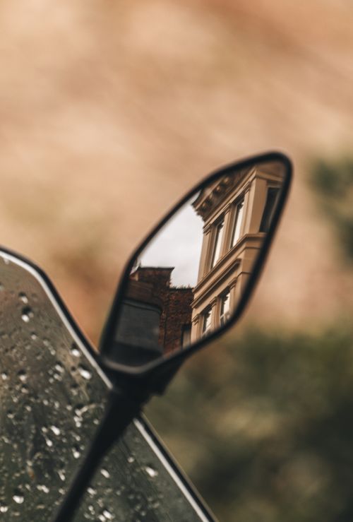 Free Reflection of historical Istanbul architecture in a motorcycle mirror with raindrops. Stock Photo